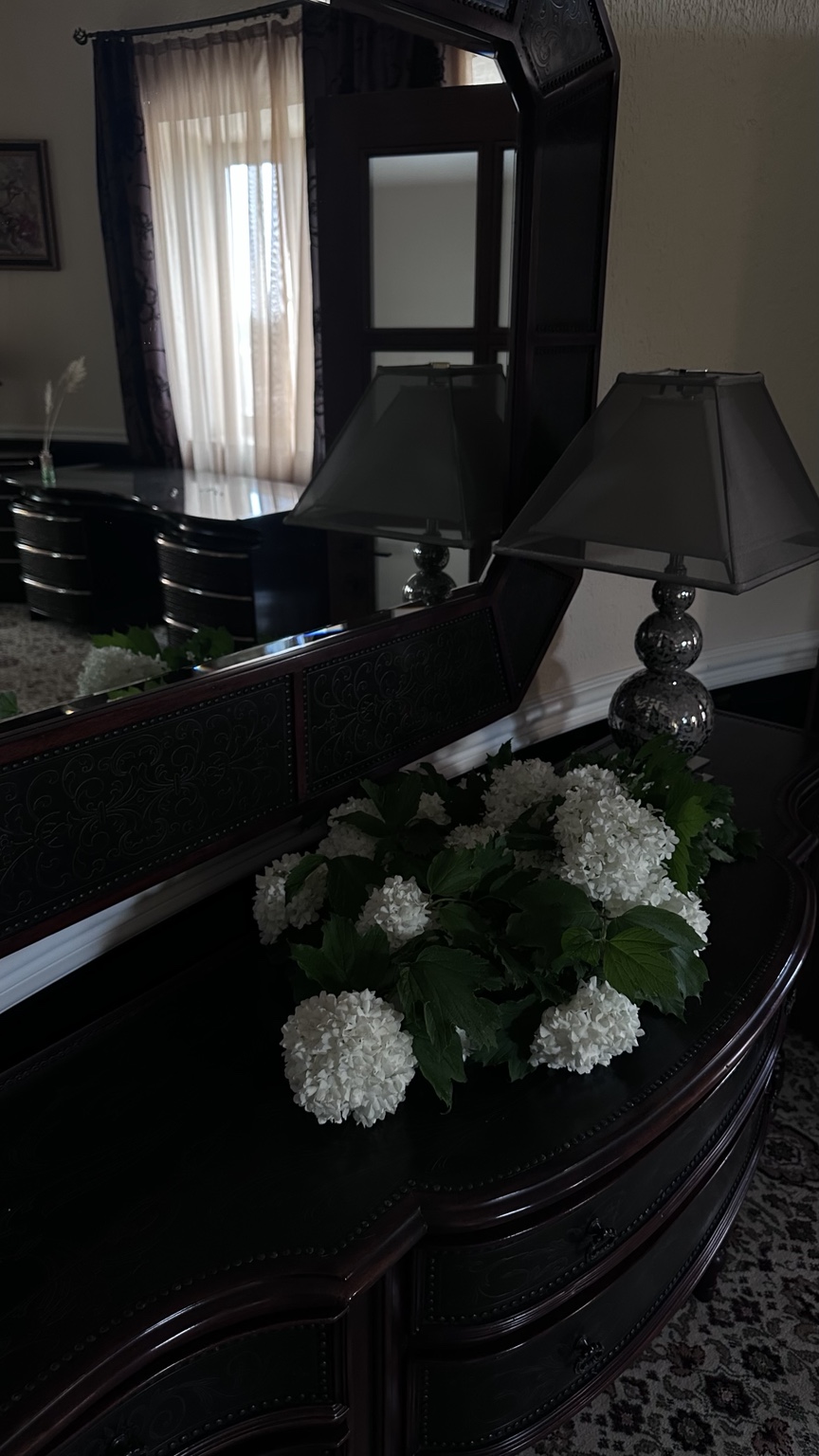Flowers and carved wood